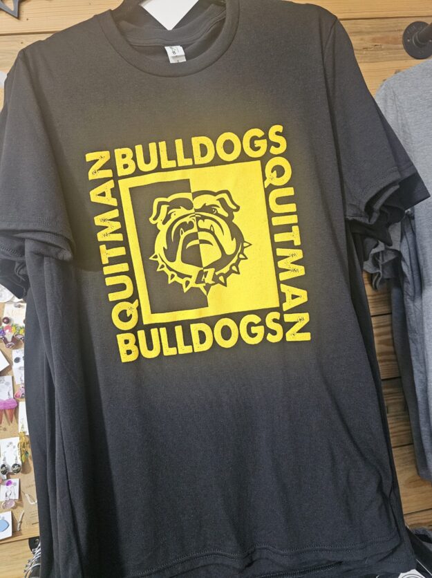 Black shirt with Gold square and Quitman Bulldogs